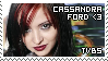 Stamp woman black hair dark red tinges smiling at camera - text Cassandra Ford TVBS