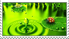 Stamp ladybug on lilypad green pond water drop slow motion